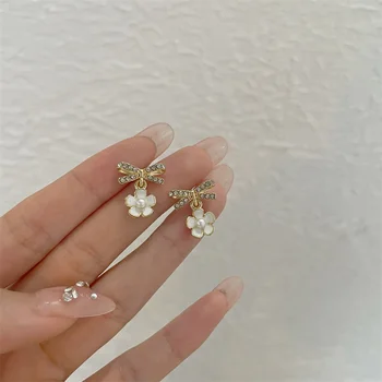 Elegantiškas cirkonas Bowknot perlų žiedų smeigės auskarai Išskirtinės lanko krištolo gėlės pakabukas Auskarai Temperamentas Moteriškos papuošalų dovanos