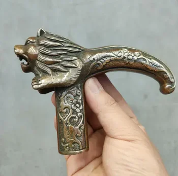 kinų senos bronzinės rankomis raižytos liūto statulos Antikvarinės cukranendrių lazdos galva