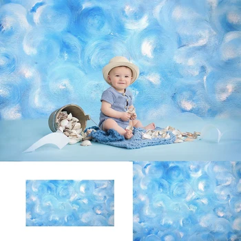 Mėlynai dažyta siena-naujagimiai Vaikų portretas Fonas Mėlynas debesų dažai Sienos fonas Gimtadienio tortas Sutriuškinti fotostudijos rekvizitus