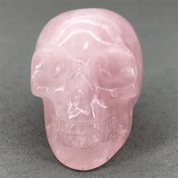 Natūralaus akmens krištolo raižytas 2 colių rožinio krištolo kaukolės figūrėlių kolekcija rankdarbių dovanos maži papuošalai