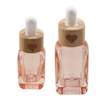 Stiklinis lašintuvo buteliukas tuščias skaidrus rožinis daugkartinio naudojimo nešiojamas mini storas laikymo buteliukas Akių lašintuvo buteliukas plaukų aliejų kvepalams
